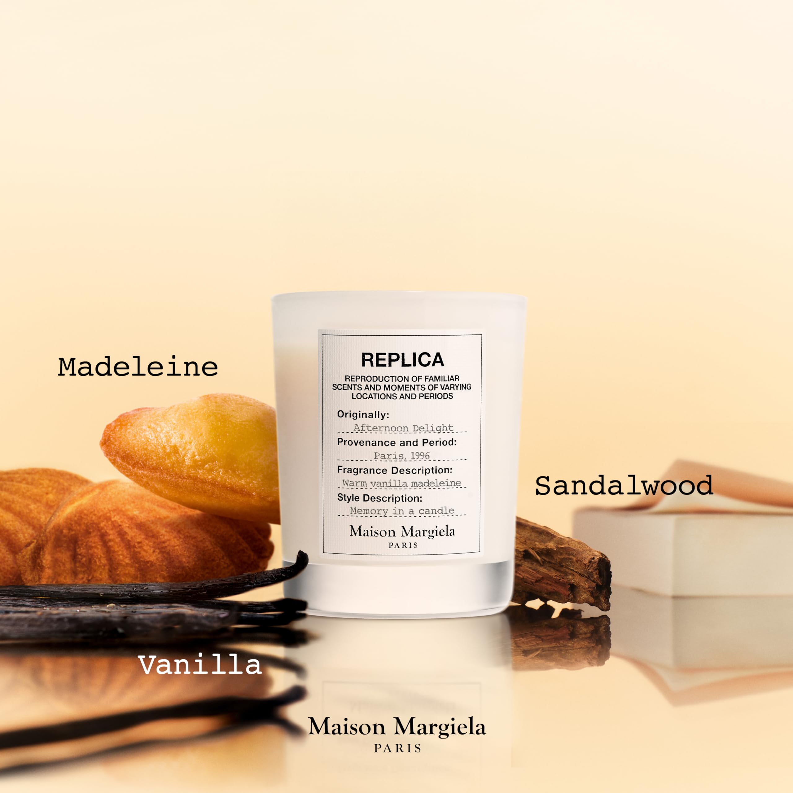 Maison Margiela candle lit in a room creating a cozy amber atmosphere