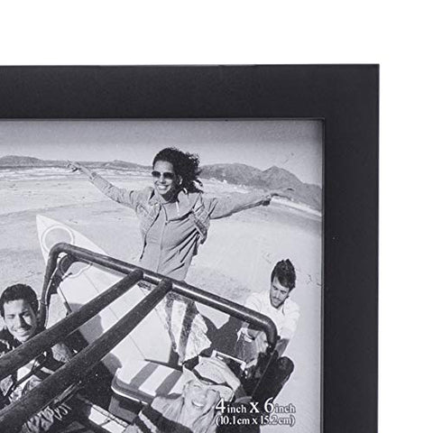 Malden collage frame hung above sofa demonstrating how the brand enhances living room décor