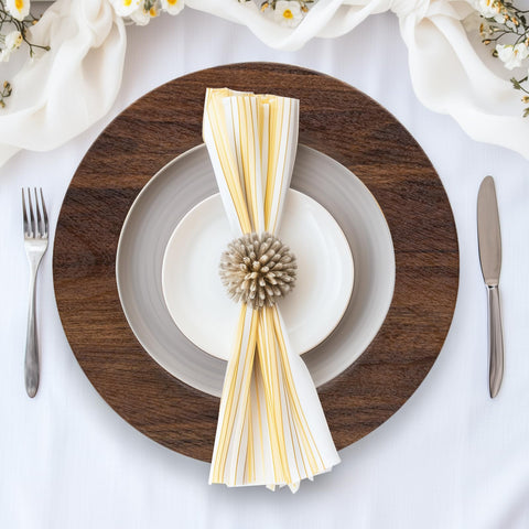 MAONAME charger plate beside standard dinner plate showing size and protective coverage