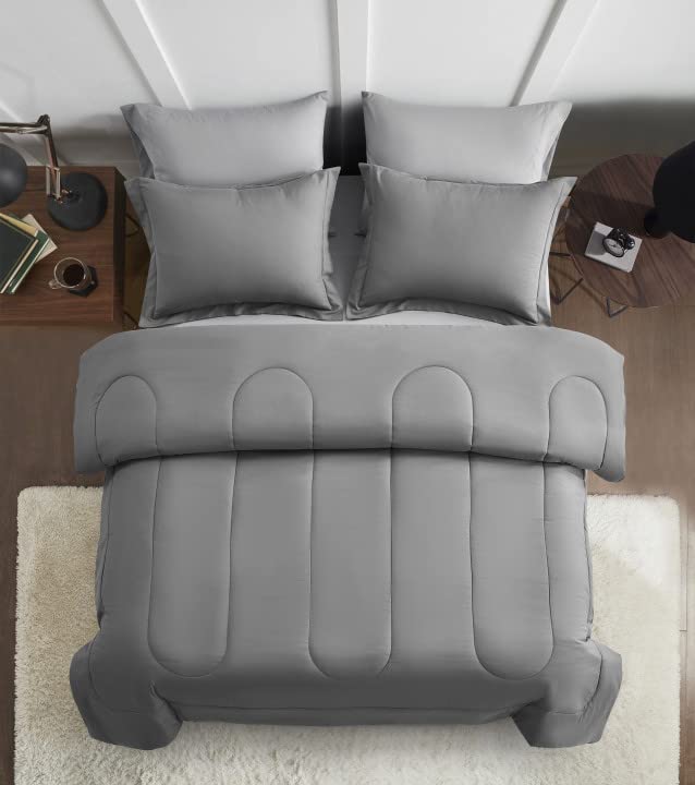 Maple&Stone styled bed in bedroom showing cohesive grey aesthetic