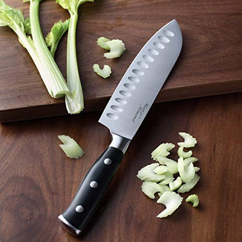 Marco Almond knife beside hand for size comparison and confident handling