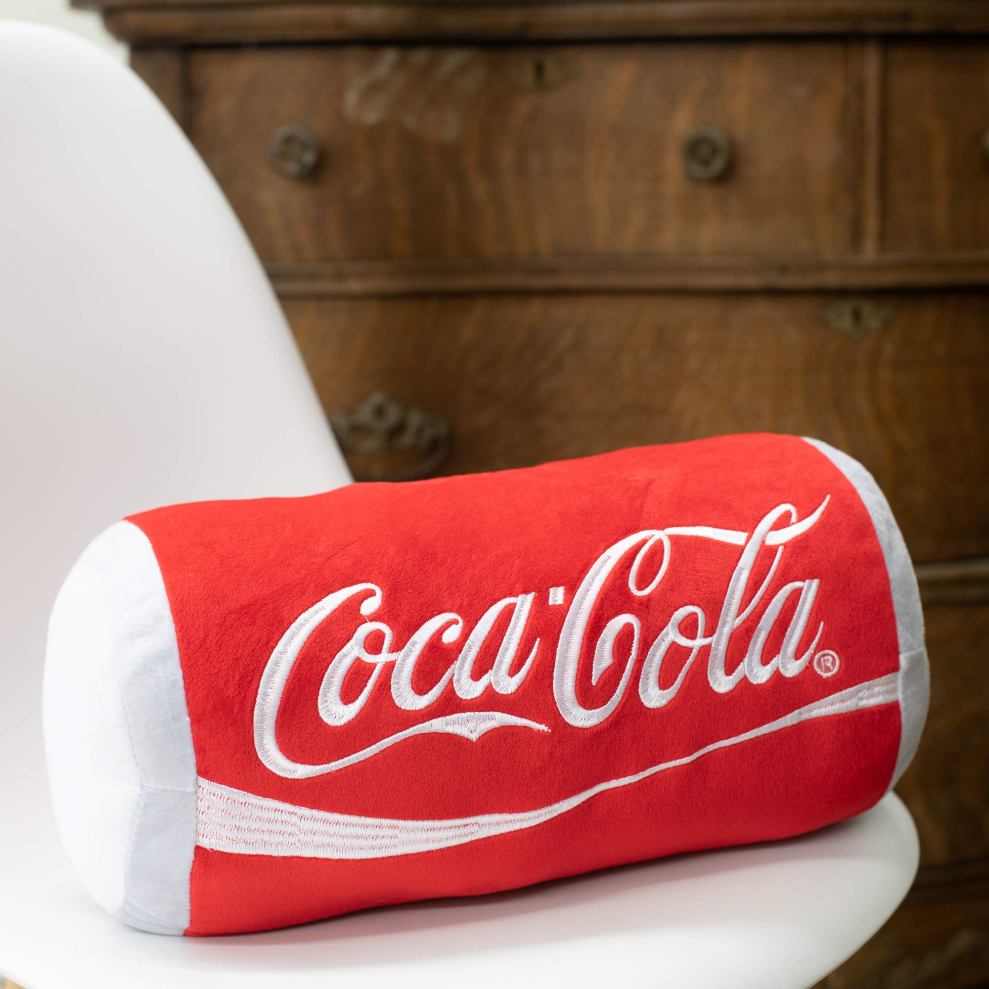 Mark Feldstein Coca-Cola side profile illustrating the plush can silhouette and compact display use
