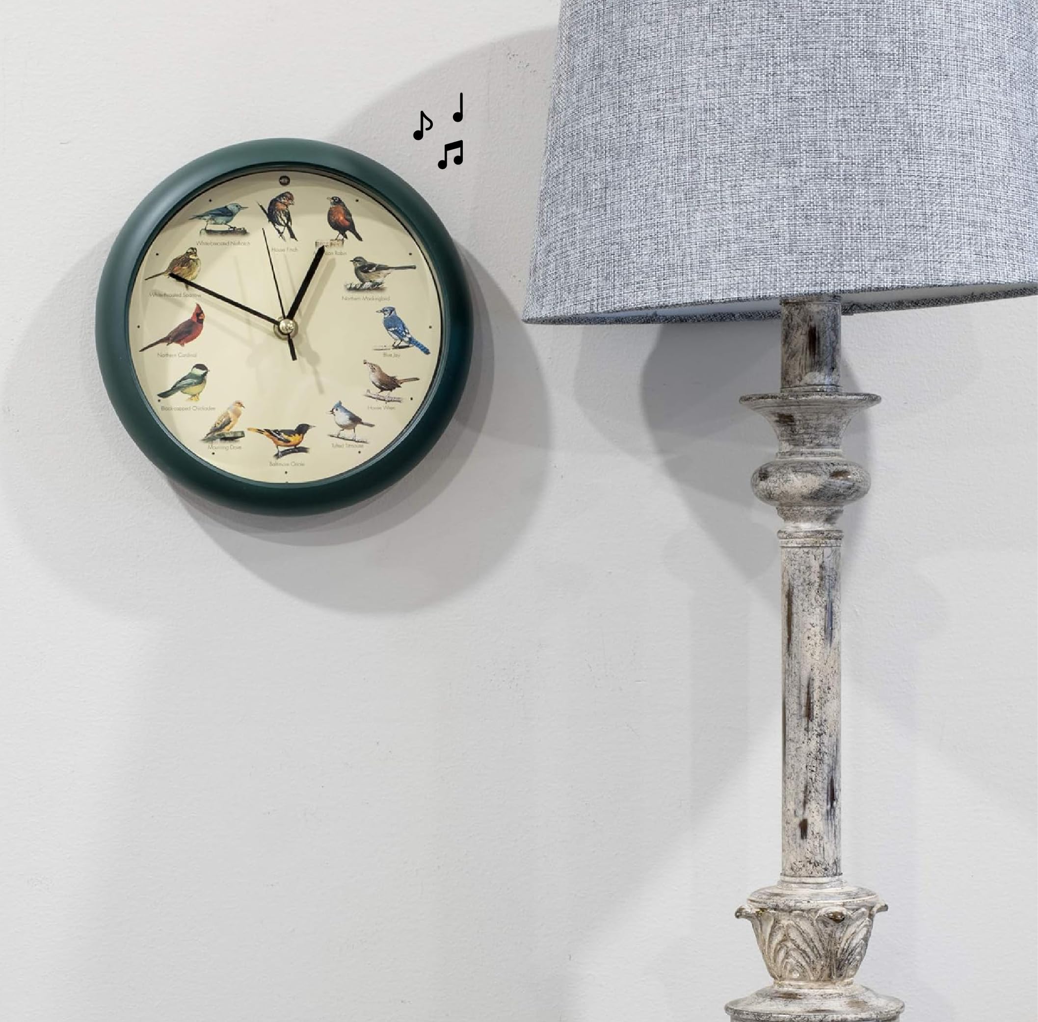 Mark Feldstein in kitchen wall display adding nature-themed decor and pleasant hourly cues