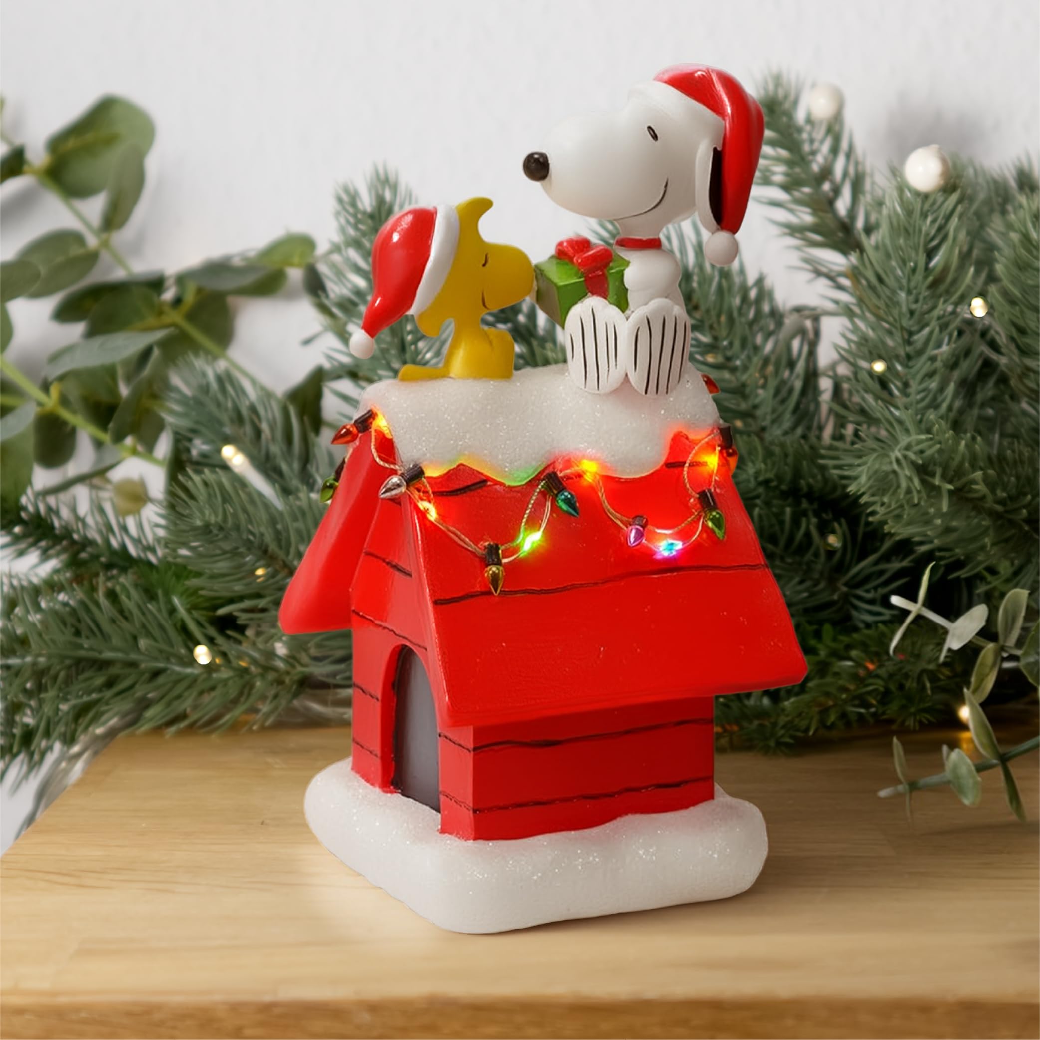 Mark Feldstein mantel display showing how the figurine brightens holiday decor