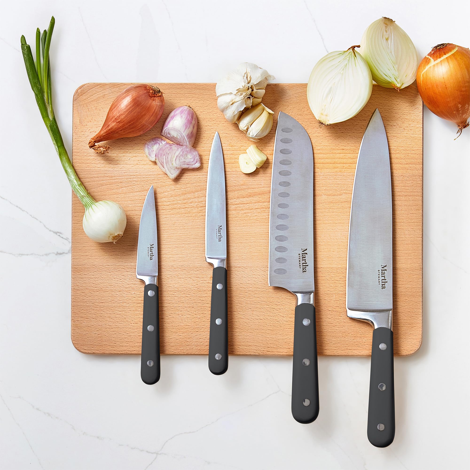 Martha Stewart knife set beside common kitchen items, illustrating scale and convenience