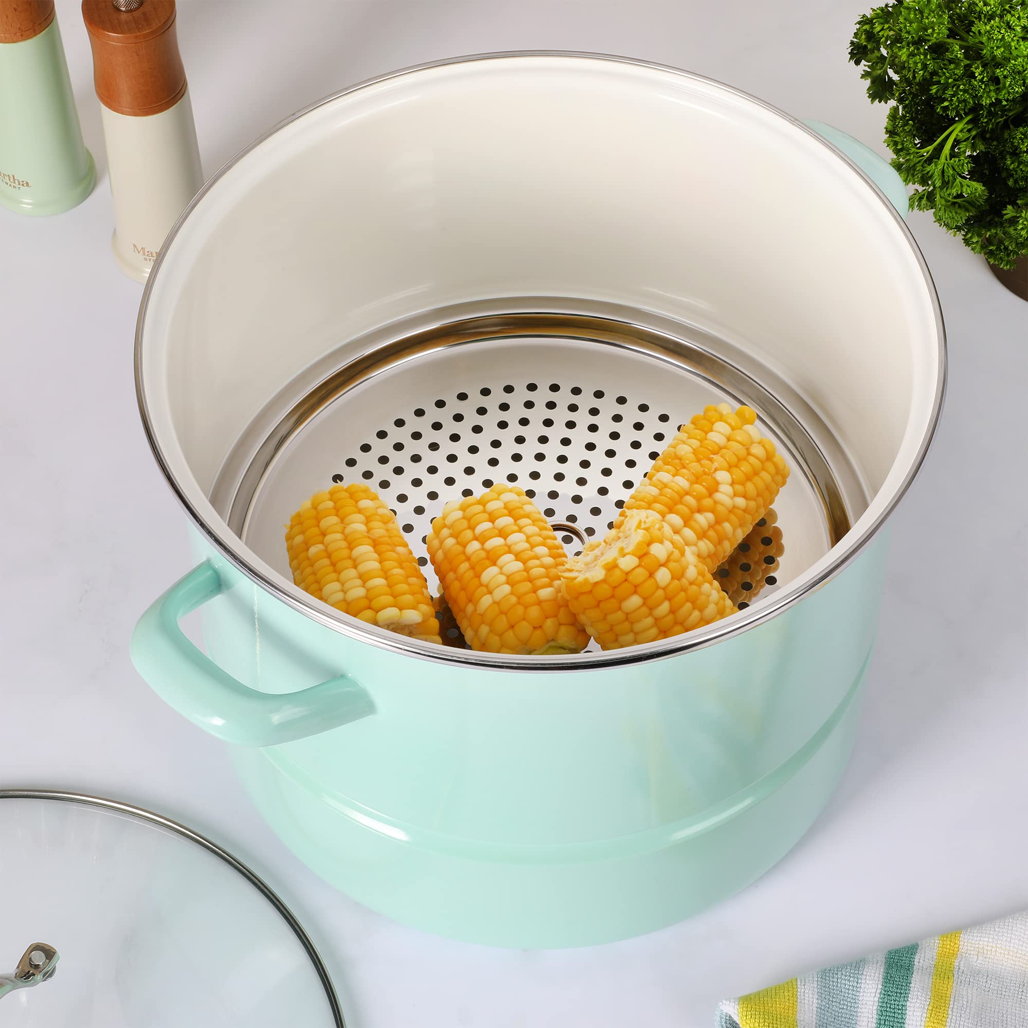 Martha Stewart pot beside sink for scale showing generous 16-quart capacity advantage