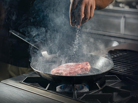 Matfer pan on induction cooktop demonstrating compatibility and rapid thermal response