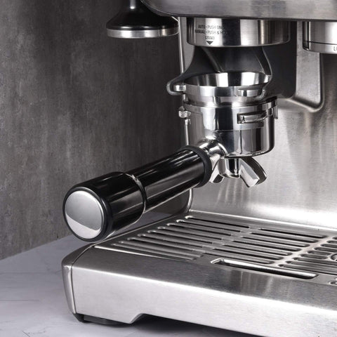 MATOW funnel in use under grinder showing hands-free, clean grinding