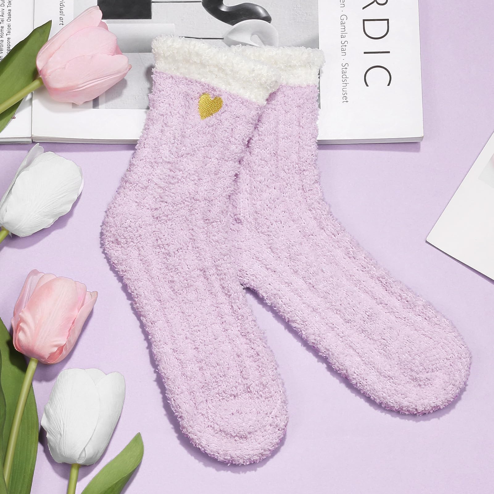 MAYICIVO fuzzy socks paired with blanket conveying warmth and at-home relaxation