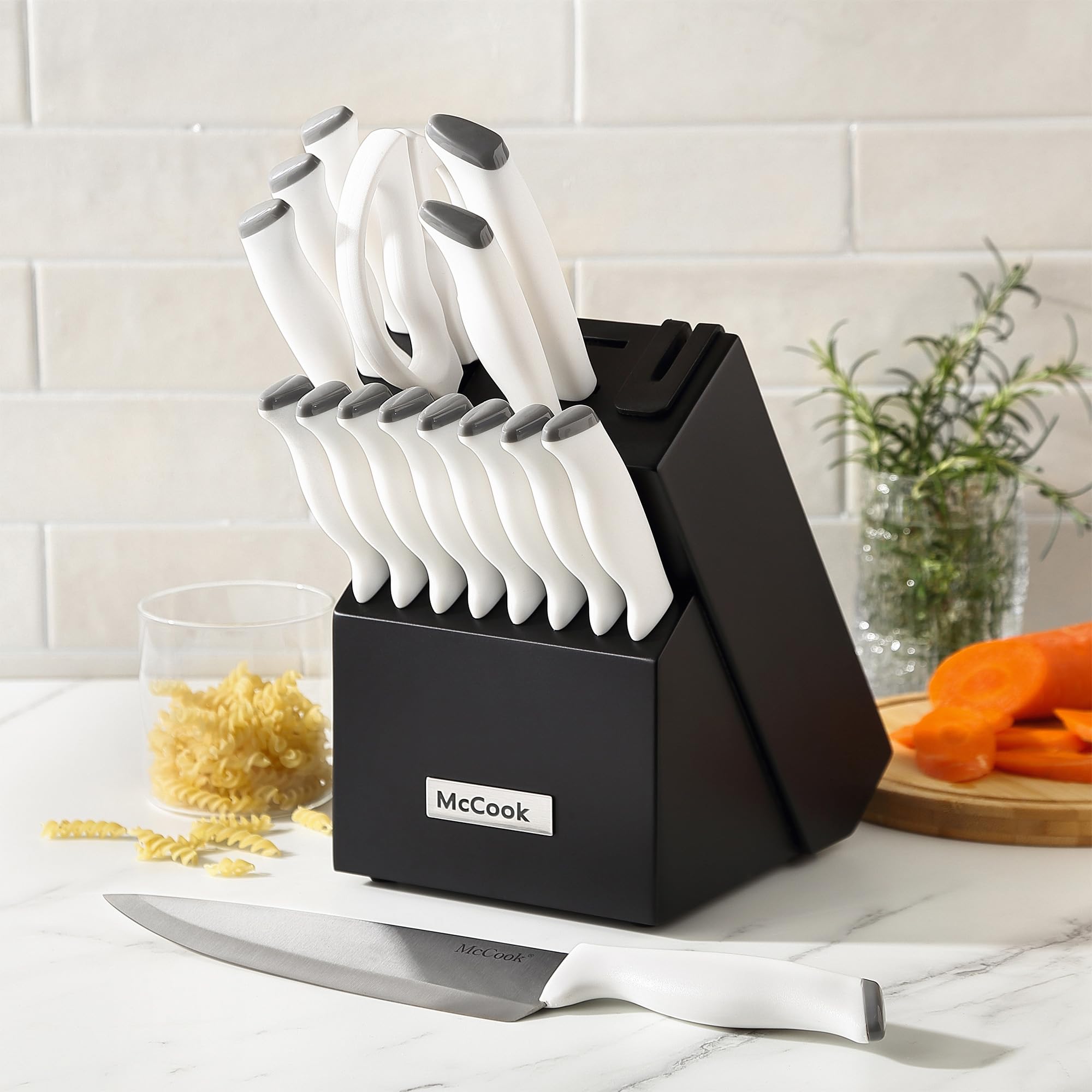 McCook lifestyle scene with knives on cutting board demonstrating real kitchen performance