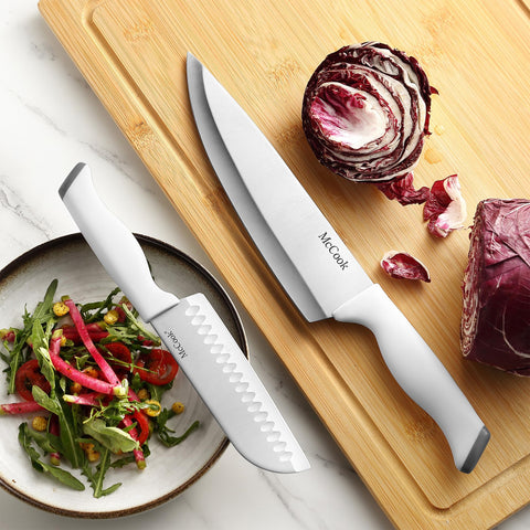 McCook steak knives and shears laid out for table service and versatile kitchen use