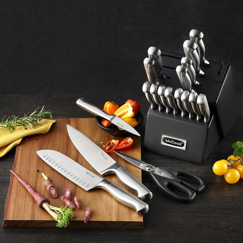 McCook utility and paring knives in use demonstrating precise cutting performance