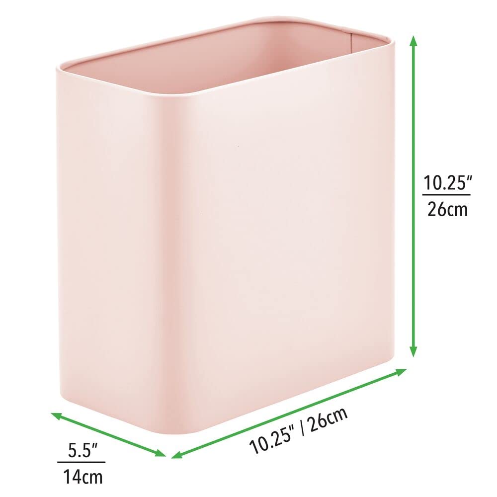 mDesign bin next to toilet demonstrating compact placement and tidy storage