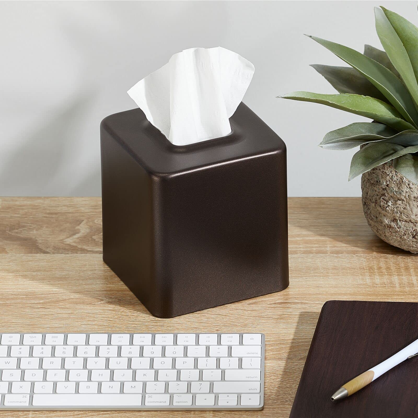 mDesign bronze tissue holder on bathroom vanity creating organized, stylish countertop benefit