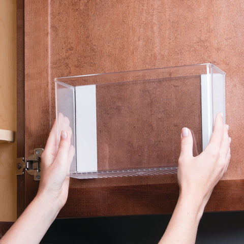 mDesign bin next to a ruler showing compact 11-inch size and scale