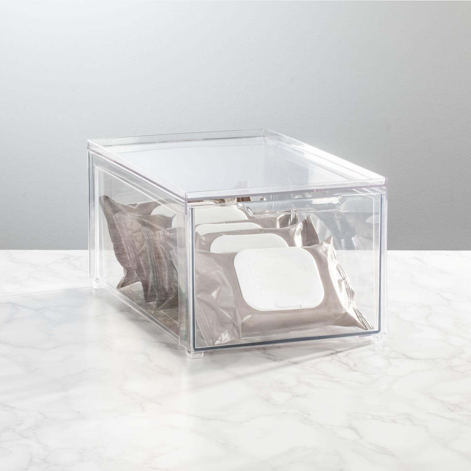mDesign on bathroom vanity with cosmetics for countertop decluttering