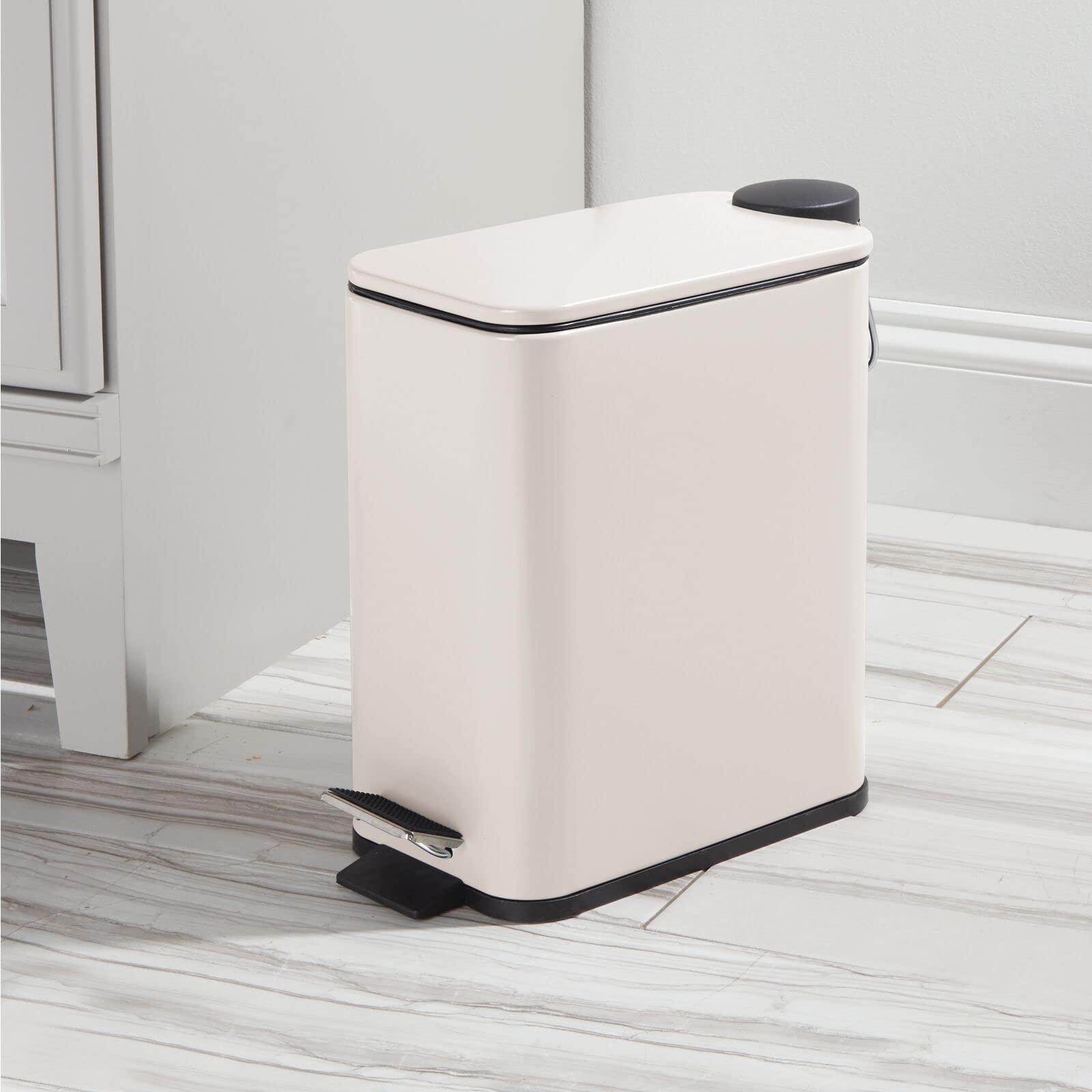 mDesign open lid with foot pedal demonstrated for hygienic disposal