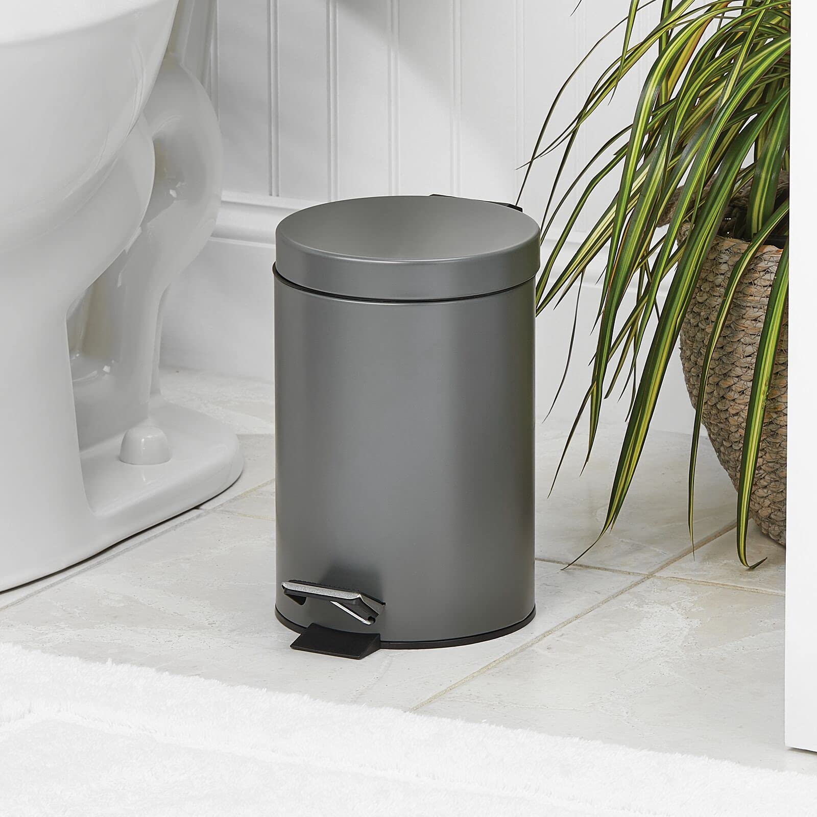 mDesign pedal bin with lid open showing hands-free access and covered waste