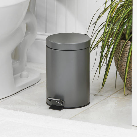 mDesign pedal bin with lid open showing hands-free access and covered waste