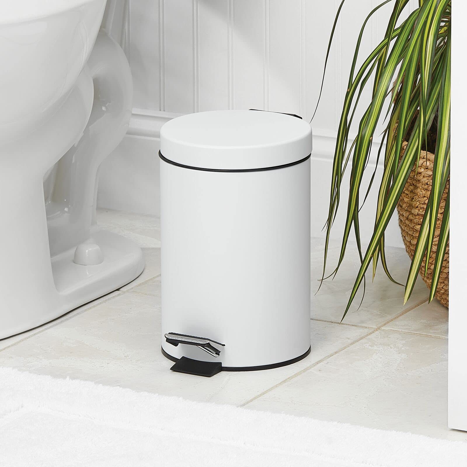 mDesign pedal bin lid open demonstrating hands-free access and soft-close convenience