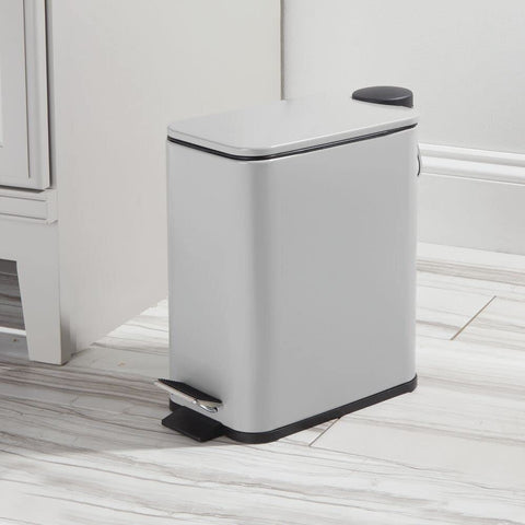 mDesign removable inner bucket close-up showing easy emptying feature