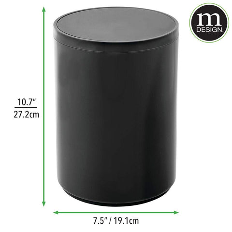 mDesign scale with hand demonstrating lightweight portability