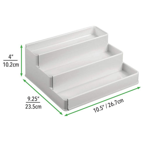 mDesign expanded width demonstrating adjustable fit for cupboards