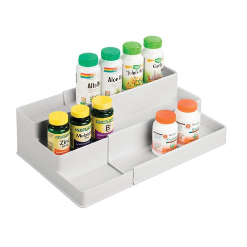 mDesign holding medicine bottles for clear label visibility and safety