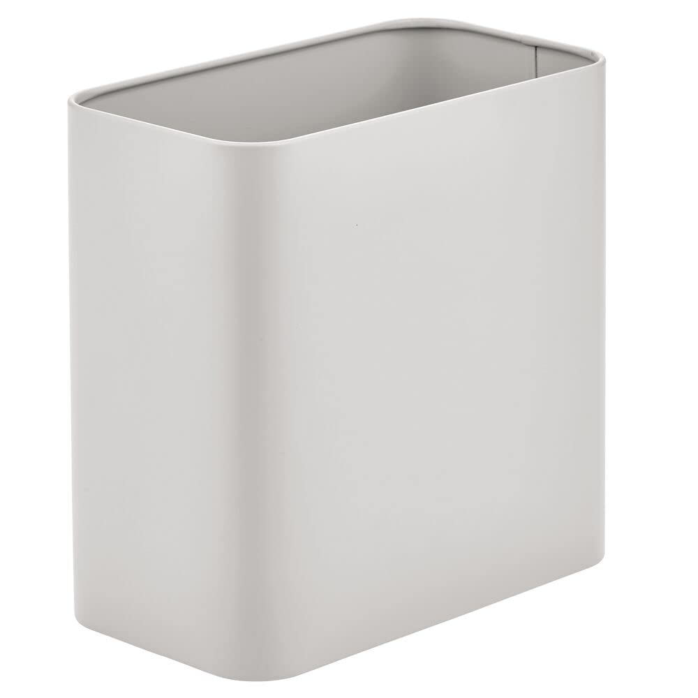 mDesign front view of small metal trash can showing compact shape and tidy look