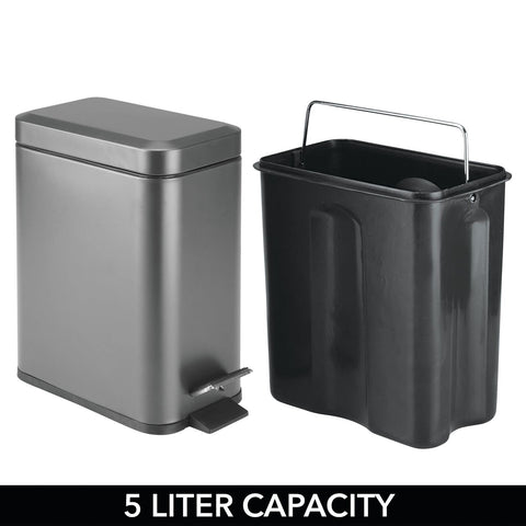 mDesign trash can by bathroom vanity illustrating compact fit and tidy look benefit