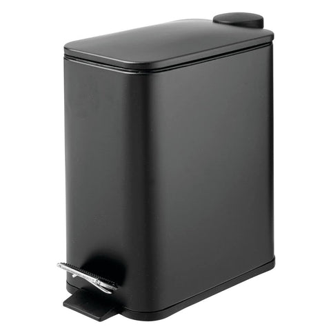 mDesign trash can placed in bathroom setting highlighting tidy, minimalist storage
