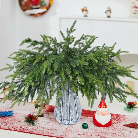 MDSTBN arranged pine branches in clear vase showing easy decor upgrade benefit