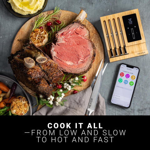MEATER probes inserted in oven roasts, simultaneous multi-meat temperature tracking