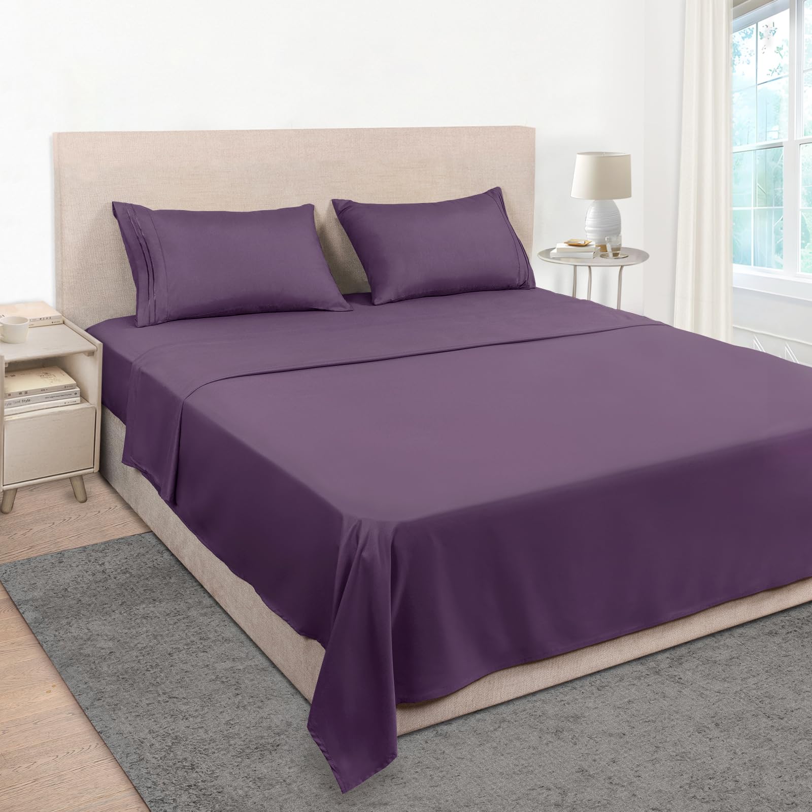 Mejoroom queen set front view showing neat purple bedding and hotel-style finish