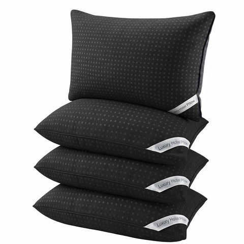 Melising front view of four black pillows showing coordinated hotel look and instant bedroom upgrade