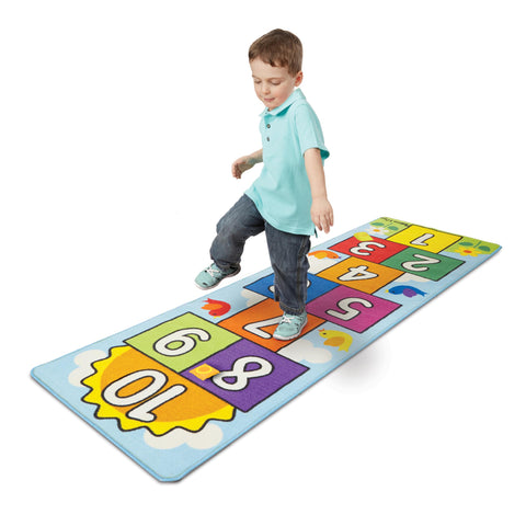 Melissa & Doug two colorful beanbags on rug used for tossing games and turn-taking practice