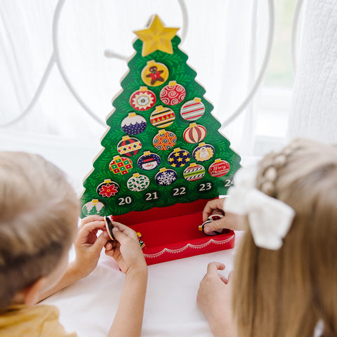 Melissa & Doug close-up of wooden magnetic ornament highlighting durable finish and easy-grip design benefit