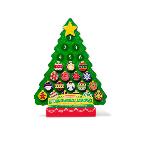 Melissa & Doug hand next to tree showing scale and compact size for shelf or tabletop benefit
