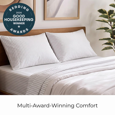 Mellanni flat sheet unfolded on bed showing full queen coverage and easy bed-making benefit