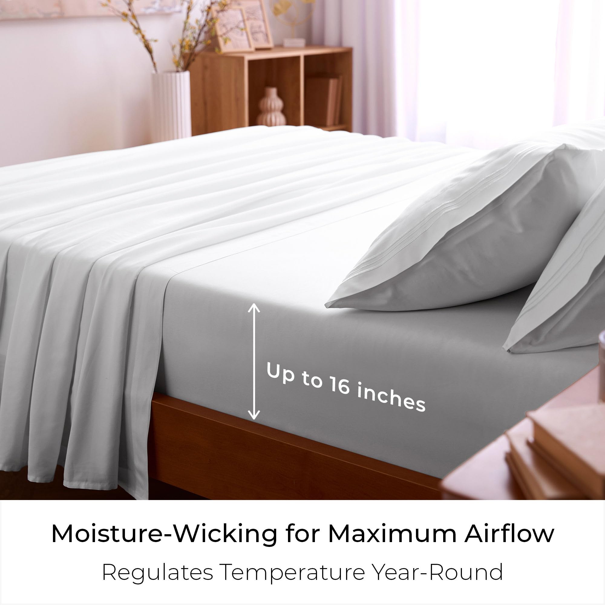 Made bed with Mellanni sheets in white creating a hotel-like, comfortable bedroom setting