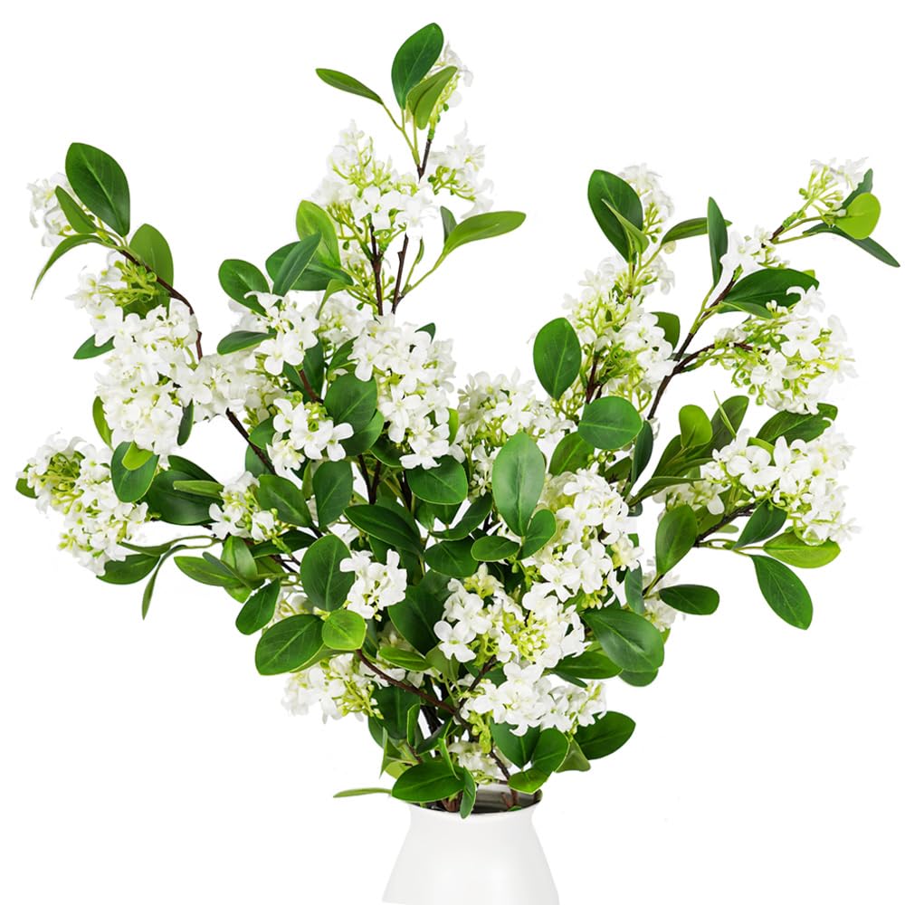 Melorca&Guilla faux branches styled on a console table enhancing room decor benefit