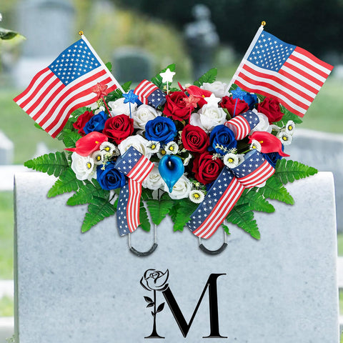 Memobloom front view of patriotic saddle showing vibrant red white blue blooms and flags for respectful tribute