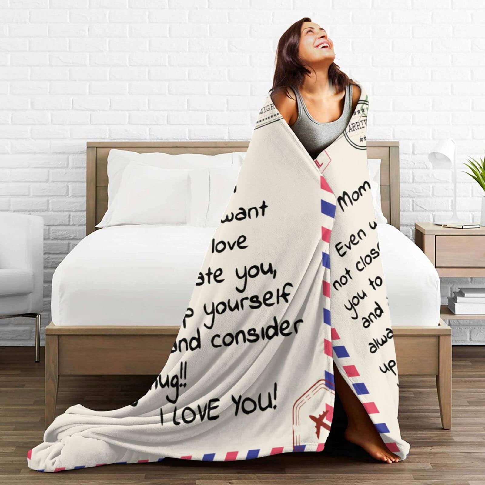 Menghao throw draped on couch showing cozy living-room use and warmth