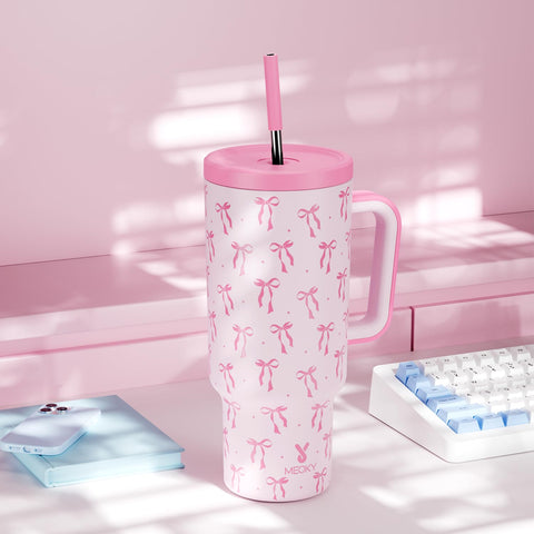 Meoky tumbler on picnic table showing durability and on-the-go hydration benefit