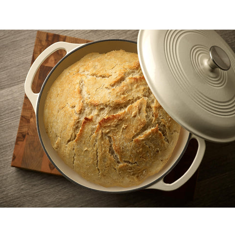 Mercer Culinary Dutch oven with baked loaf inside showing even oven baking and crust development