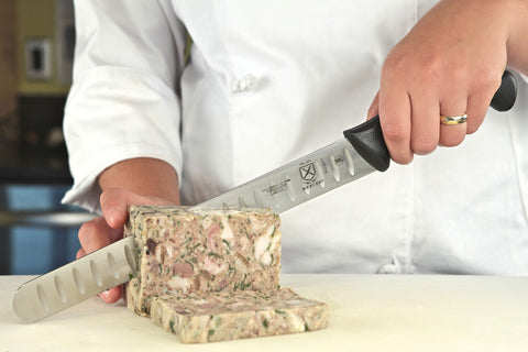 Mercer Culinary Millennia blade edge closeup highlighting sharp Japanese steel for precise cuts