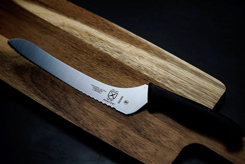 Mercer Millennia knife beside ruler for scale showing 9-inch blade length for accurate kitchen planning