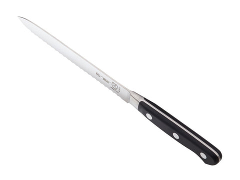 Mercer Culinary Renaissance next to ruler on cutting board showing compact 5-inch scale