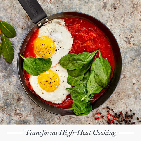Merten & Storck skillet in oven with baked dish illustrating oven-safe versatility and finish