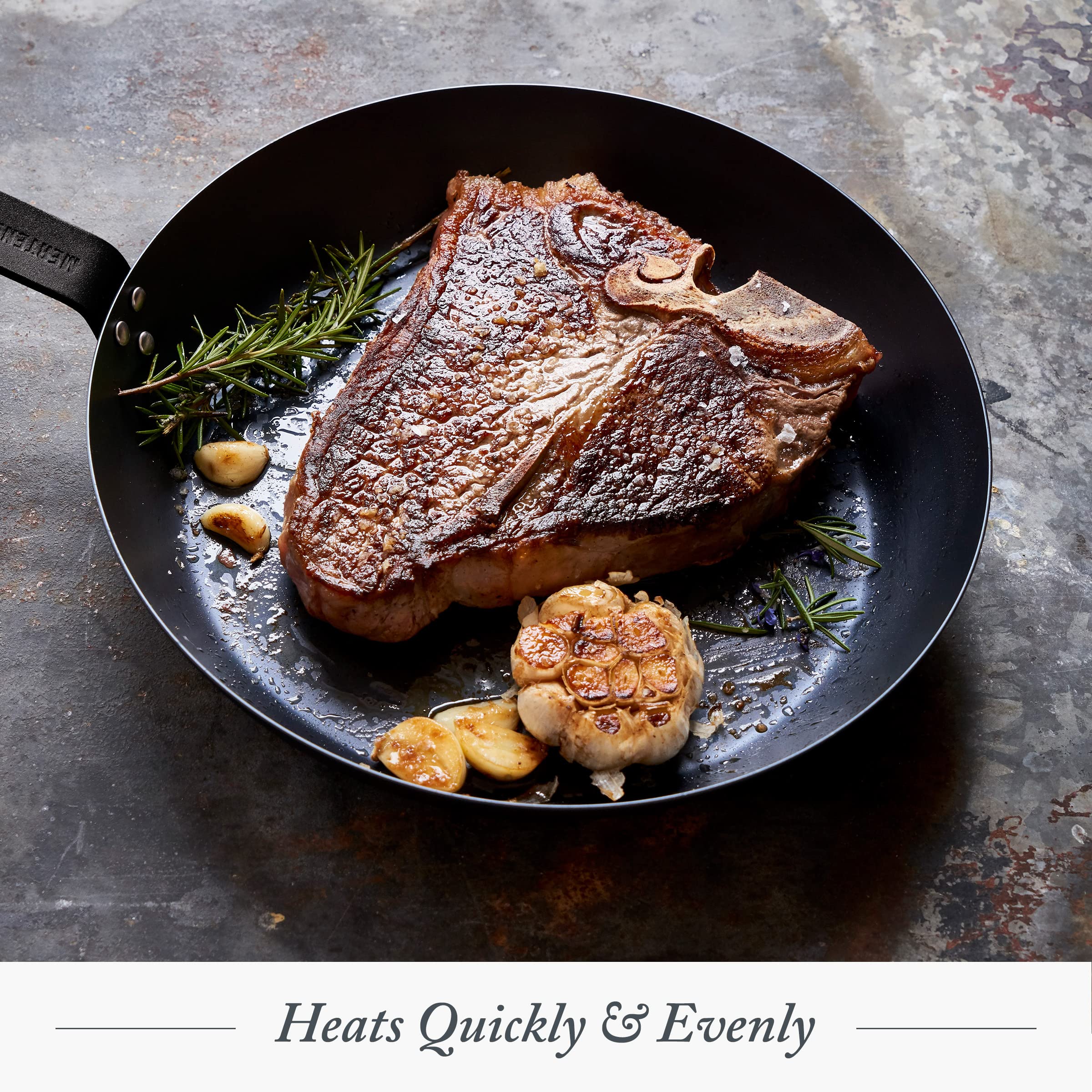 Merten & Storck skillet held in hand for scale to show lightweight, easy-to-handle design